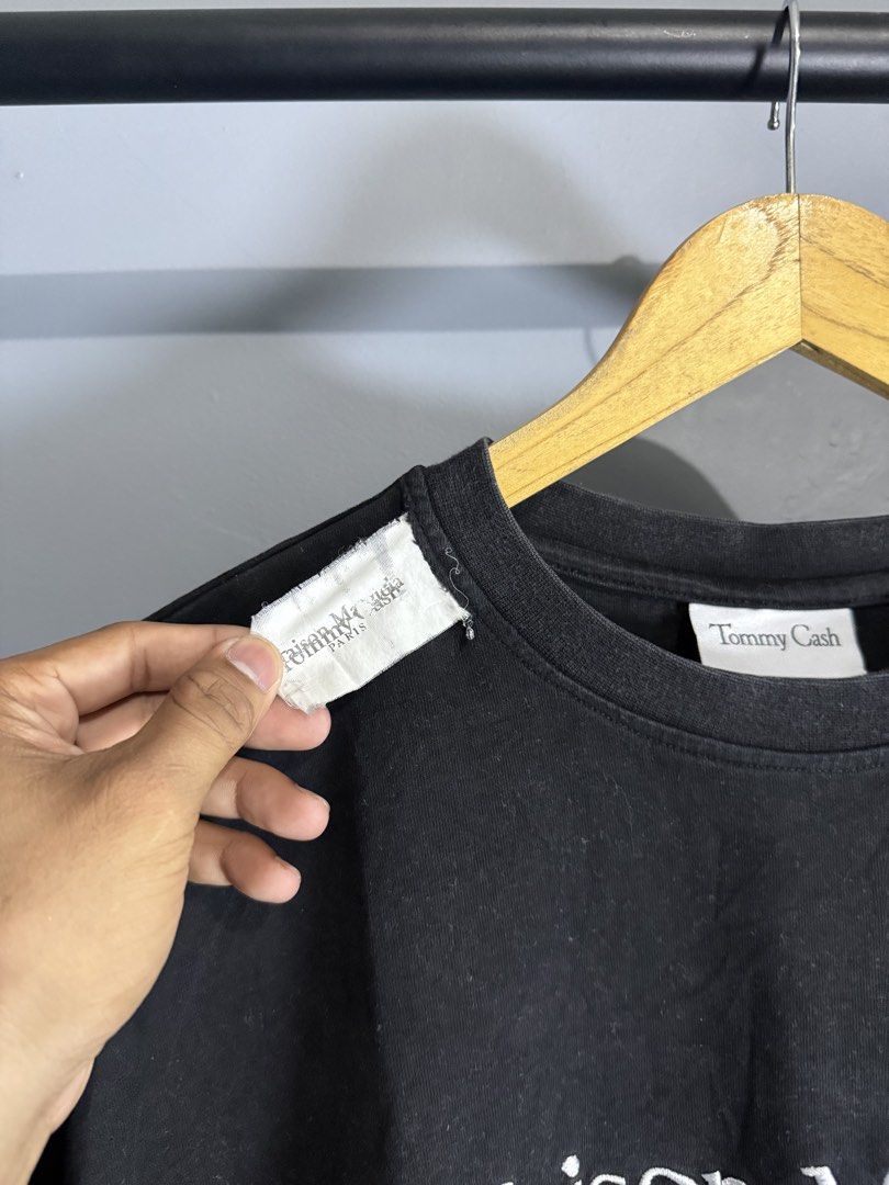 Maison margiela x tommy cash (Category: Activewear) located in Batangas. Submitted by robertlopezigaya (Listing ID 1457918889, Image 3). Description: Maison margiela x tommy cash Size L on tag Dimes 23x28 Color rate 9/10 Condition 9/10 Minor issue sa neck puti puti konti pero goods padin.