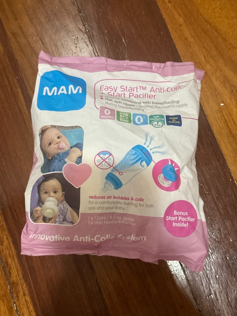 MAM Easy Start Anti-Colic Bottle & Pacifier Set (Category: Breastfeeding & Bottle Feeding) located in Makati City. Submitted by travelfinds34611 (Listing ID 1457985402, Image 1). Description: BRAND NEW. Never opened but bag has a slight opening on one corner MAM Easy Start Anti-Colic + Start Pacifier Set Includes: - 1 x 130ml / 4.5oz bottle - 1 x Start Newborn Pacifier - Innovative anti-colic system reduces air bubbles and colic - Perfect for new