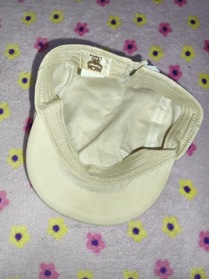 MCM Legere Cap (Category: Caps & Hats) located in Bulacan. Submitted by THA_D_THRIFT (Listing ID 1458077862, Image 3). Description: - MCM Legere Cap - Color: Light Beige - Style: Classic Flat Cap - Features MCM logo on the side - Adjustable strap at the back - Ideal for sunny days or completing your outfit 650 + SF.