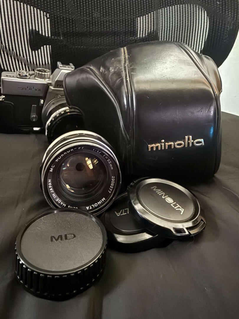 Minolta SRT101 Film Camera with 2 Lenses (Category: Cameras) located in Manila. Submitted by kyleaustin82413 (Listing ID 1458038537, Image 3). Description: Helping my friend out Minolta SRT 101 Film Camera - Light meter working and still has battery Condition: Excellent working condition with some normal wear and tear. Includes: - Minolta MC Rokkor-PF 55mm f/1.7 lens - Sankyo Kohki W-Komura 28mm f/3.5 lens - Minolta leather case and strap - Lens 
