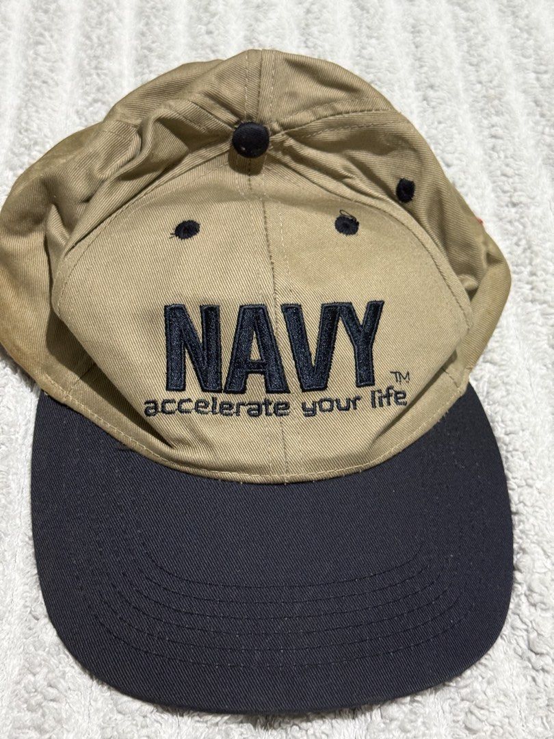 Official U.S. Navy "Accelerate Your Life" Vintage Cap — Khaki & Navy (Category: Caps & Hats) located in Agdangan. Submitted by raven_ravenly123 (Listing ID 1458003074, Image 3). Description: Official U.S. Navy “Accelerate Your Life” Vintage Cap — Khaki & Navy Description: Grab a piece of classic military Americana with this official U.S. Navy recruitment cap. Features clean embroidered “NAVY” lettering on the front, the iconic “accelerate your li