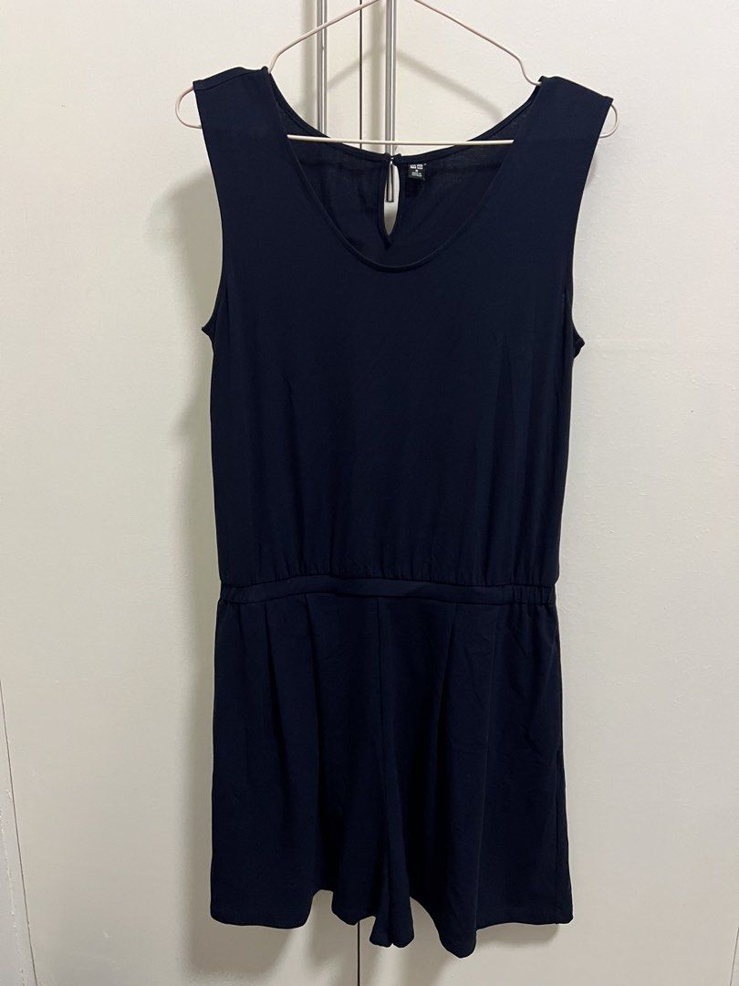 Navy Blue Sleeveless Romper with Elastic Waist (Category: Rompers) located in Angeles City. Submitted by lovinthrift (Listing ID 1458061992, Image 2). Description: - Navy blue sleeveless romper - Elastic waistband for a flattering fit - Convenient side pockets - Versatile for casual outings or dressing up - Comfortable and easy to wear.