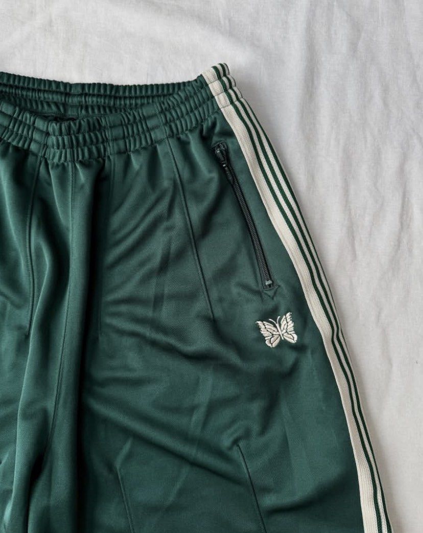 Needles LHP track short green poly ( baggy ) (Category: Shorts) located in Pasig City. Submitted by paymelikelandlord (Listing ID 1458092337, Image 3). Description: SALE ONLY Needles LHP track short green poly ( baggy ) Hunter green color way Excellent condition as new No hidden issue no flaw .