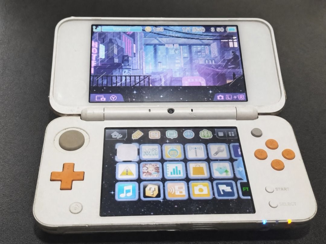 New Nintendo 2DS XL 64GB Fully Tested + Third-Party Starter Bundle (Category: Nintendo) located in Manila. Submitted by wackyyyyyy (Listing ID 1458036045, Image 1). Description: Used New Nintendo 2DS XL for sale. Good working condition, with photos of the powered-on screens and close-ups of the shell, hinge, controls and charging port. Buyer may test the unit before payment. Inclusions: console with tested 64GB SD card, third-party transparent ca