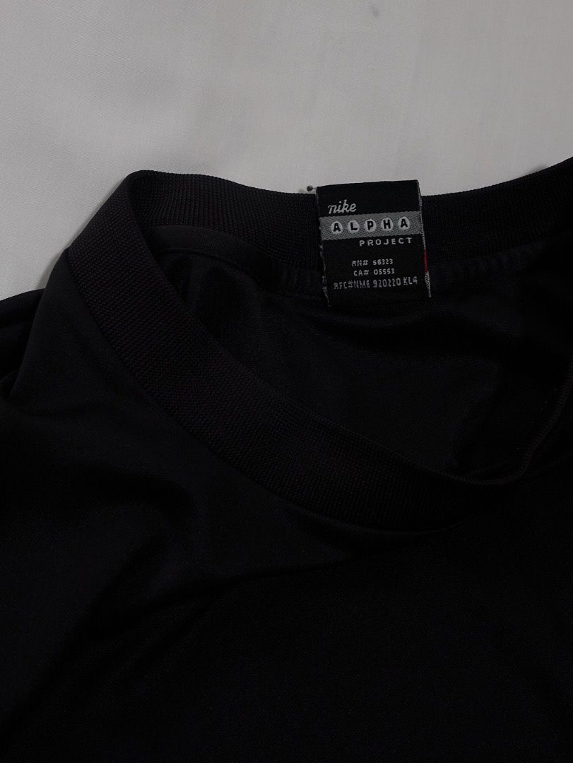 Nike Alpha Project T-Shirt Black (Category: Activewear) located in Quezon City. Submitted by soourceph (Listing ID 1458083381, Image 3). Description: SS2000 Nike Alpha Project—Dri-Fit Tech Shirt One of Nike’s most recognizable pieces. The DRI-Fit tee shirt is remastered for Alpha Project. Boxy sleeves and ribbed neckline. Worn by Randy Moss for Nike’s Alpha Project print ads. inquiries and offers via DM Size: L fits Med to Large Material: Polyest