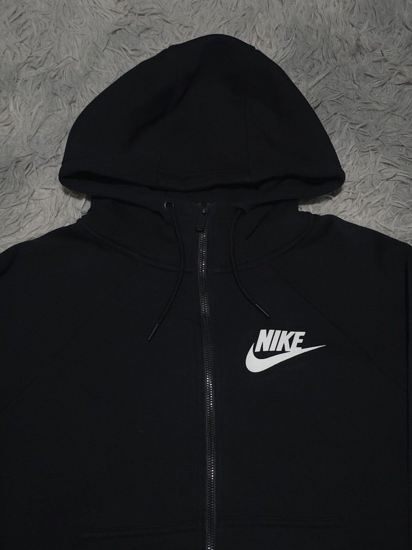 Nike Black Zip-Up Hoodie (Category: Coats, Jackets and Outerwear) located in Abulug. Submitted by humanwhosellthings (Listing ID 1458095546, Image 2). Description: - Black Nike zip-up hoodie ✅️Size Medium 21W x 24L - Classic Nike logo on chest - Drawstring hood - Pockets - Comfortable and stylish - Perfect for casual wear or workouts.