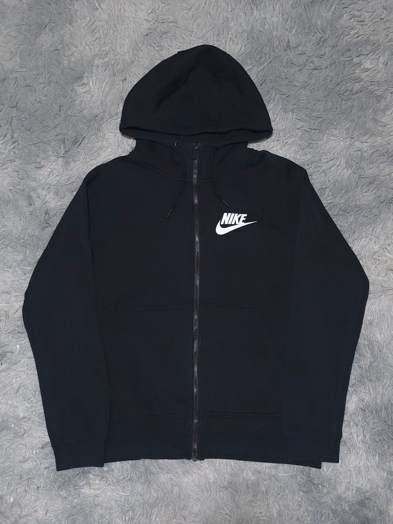Nike Black Zip-Up Hoodie (Category: Coats, Jackets and Outerwear) located in Abulug. Submitted by humanwhosellthings (Listing ID 1458095546, Image 1). Description: - Black Nike zip-up hoodie ✅️Size Medium 21W x 24L - Classic Nike logo on chest - Drawstring hood - Pockets - Comfortable and stylish - Perfect for casual wear or workouts.