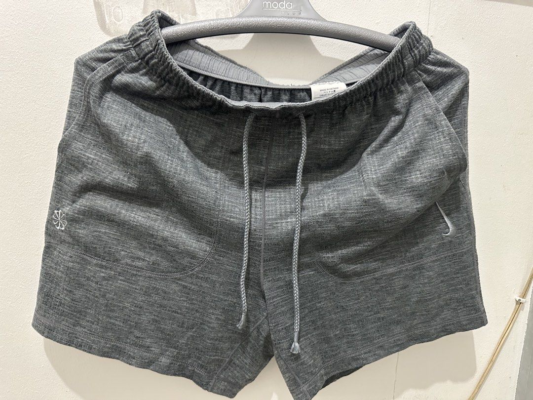 Nike Dri-FIT Grey Running Shorts M (Category: Activewear) located in Manila. Submitted by quimoi (Listing ID 1457981215, Image 1). Description: - Grey Nike running shorts - Made in Vietnam - Size M (fits 80cm waist) - 100% Polyester - Features pockets and a drawstring - Ideal for running, workouts, or casual wear.