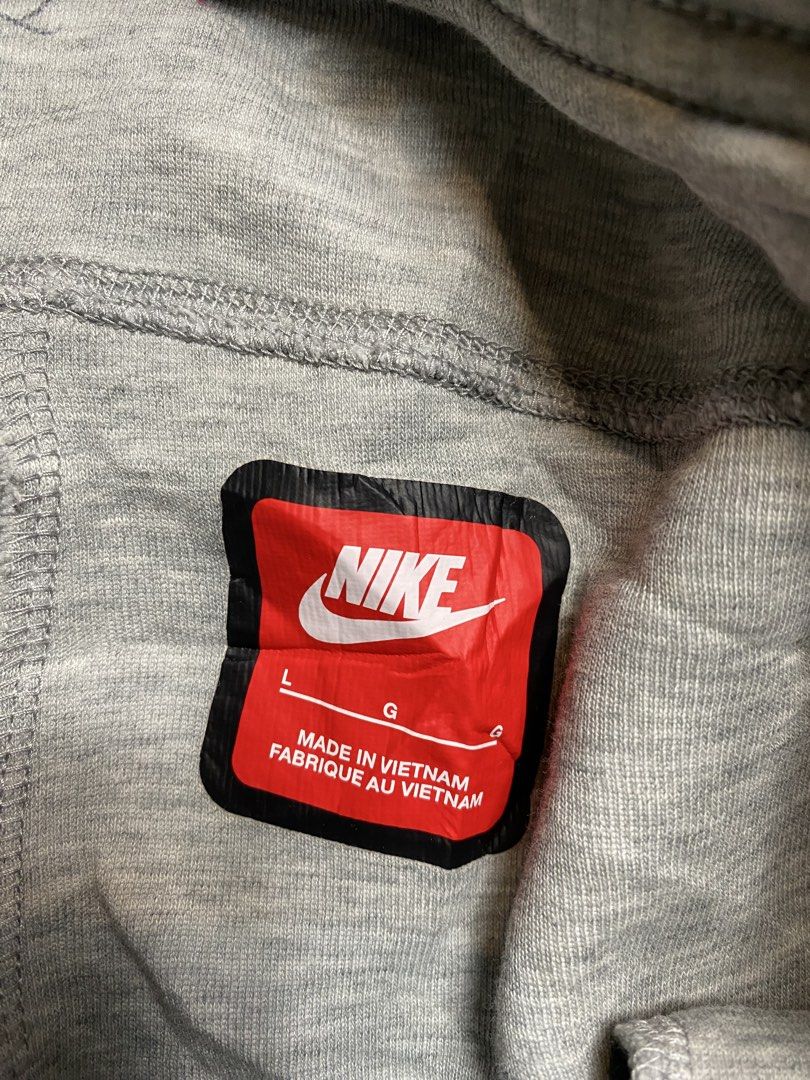 Nike Tech Fleece Grey Jogger Sweatpants Size L (Category: Joggers) located in Manila. Submitted by carbertjakosalem (Listing ID 1458006977, Image 3). Description: - Grey Nike Tech Fleece Joggers - Size: Large (L) - Authentic, Made in Vietnam - Signature side zip pocket - Adjustable drawstring waist - Ribbed cuffs for a snug fit - Perfect for everyday comfort and style.