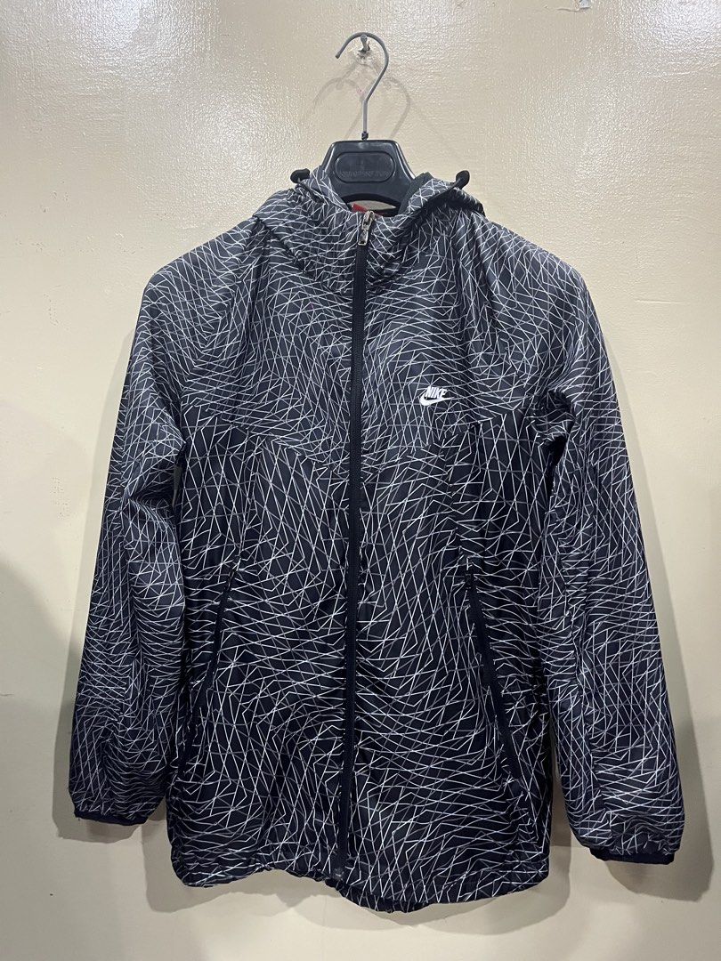 Nike Windbreaker Jacket / Black /Small (Category: Coats, Jackets and Outerwear) located in Camalaniugan. Submitted by anarchymonopoly052128 (Listing ID 1458078176, Image 1). Description: Dimension: Width 19.5Inches x Length Front 26 Inches x Length Back 29 Inches Condition: 9.5/10 Color Rate:10/10.