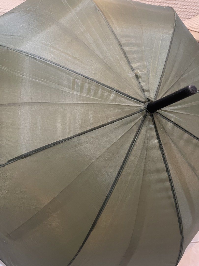 olive green long-handled umbrella with an eight-panel canopy (Category: Umbrellas) located in San Fernando. Submitted by japansurpluselyu (Listing ID 1457926296, Image 2). Description: .