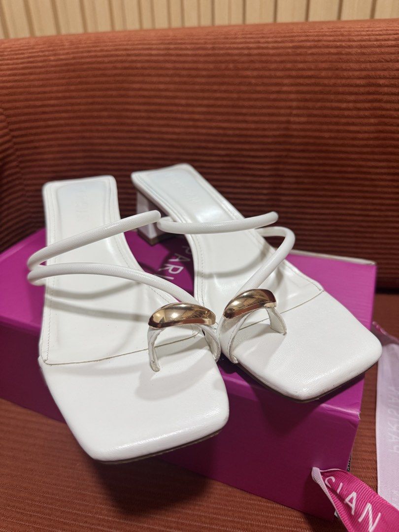 PARISIAN White Square Strappy Heels/ Sandals (Category: Flats & Sandals) located in Manila. Submitted by declutterdoctor (Listing ID 1458040895, Image 2). Description: - Parisian white heeled sandals - Size 7, 24cm - Used 3x ONLY - Square toe - Toe-loop design - Strappy with gold accent detail - Block heel - Comes with original box - Perfect for formal occasions.