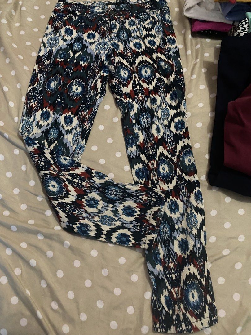 Patterned ZARA PANTS (Category: Other Bottoms) located in Lapu Lapu. Submitted by enecha (Listing ID 1457947071, Image 1). Description: - Eye-catching busy pattern with blues, white, and red accents. - Features a convenient elastic waistband. - Ideal for casual outings or relaxing at home..