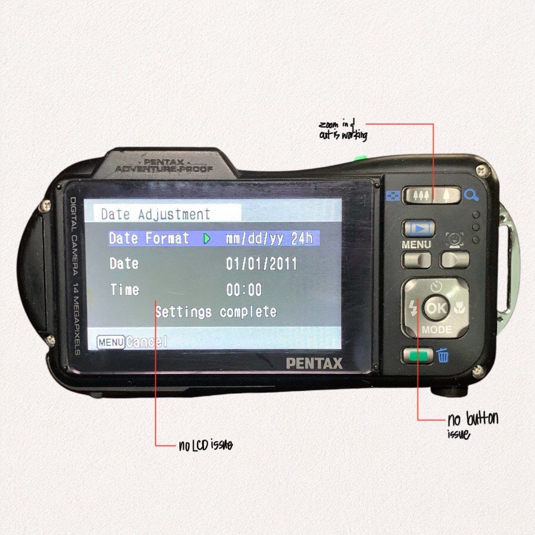 Pentax Optio WG-1 GPS (Category: Cameras) located in Quezon City. Submitted by _cyberplug (Listing ID 1457991391, Image 2). Description: Pentax Optio WG-1 GPS Price: ₱1000 Condition: ★★★ Issue: Missing top button plate / shutter button cover (shutter mechanisms and internal membranes are fully exposed; camera can still take photos, but you must press directly into the recessed cavity) Key features: • 14.0 Megapixels 1/2.3” CCD sensor • 5× wide-an