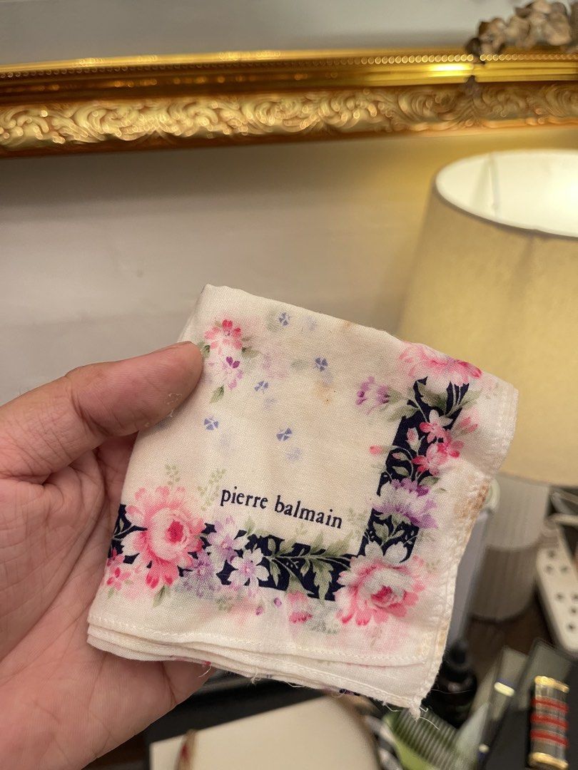 Pierre Balmain Floral Handkerchief Scarf (Category: Scarves) located in Marilao. Submitted by wardrovearchives (Listing ID 1458052363, Image 1). Description: - Vintage Pierre Balmain handkerchief - Features a pink floral print with roses - Accented with blue details - Dark navy floral border design - Classic and versatile accessory - Perfect for adding color or collecting.