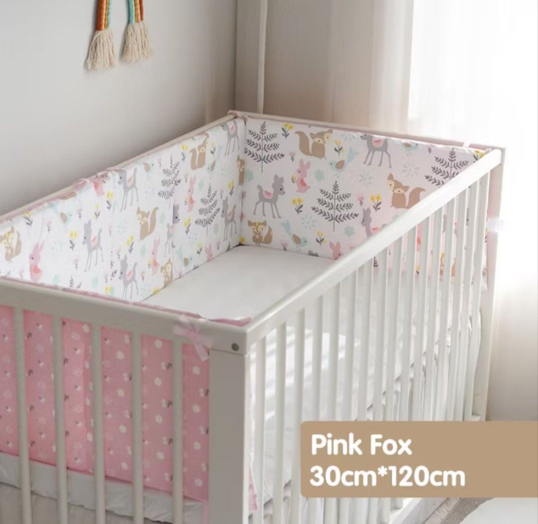 Pink Fox Crib Bumper 30cm*120cm (Category: Cots & Cribs) located in Manila. Submitted by carlierizon (Listing ID 1457920594, Image 1). Description: - Adorable crib bumper featuring a cute pink fox and woodland animal print. - Dimensions: 30cm x 120cm. - Adds a sweet and charming touch to any nursery decor. - Designed with secure ties for easy and safe attachment to crib rails. - Simple and quick to install. I have 2 available, used in less than a