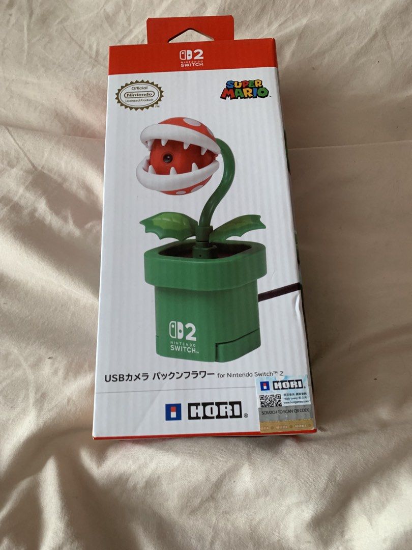 Piranha plant nintendo switch 1 and 2 camera (Category: In-Game Products) located in Manila. Submitted by catgamer (Listing ID 1457963361, Image 1). Description: This was bought on January 2026. I used it two times. Reason for selling - I bought a new camera.