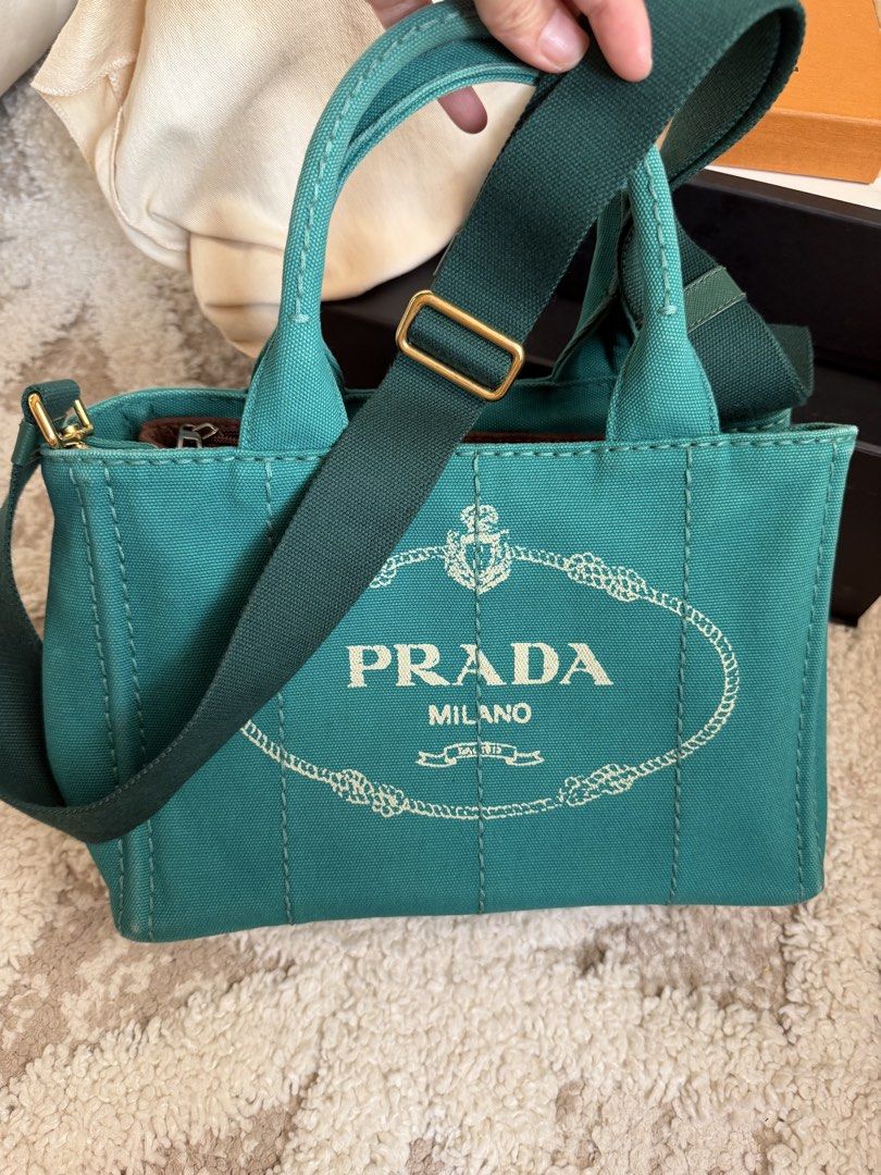 Prada canapa (Category: Cross-body Bags) located in Manila. Submitted by aleon21 (Listing ID 1458025959, Image 1). Description: Posted all photos With COA and generic dustbag This is like new all hardwares super gold.