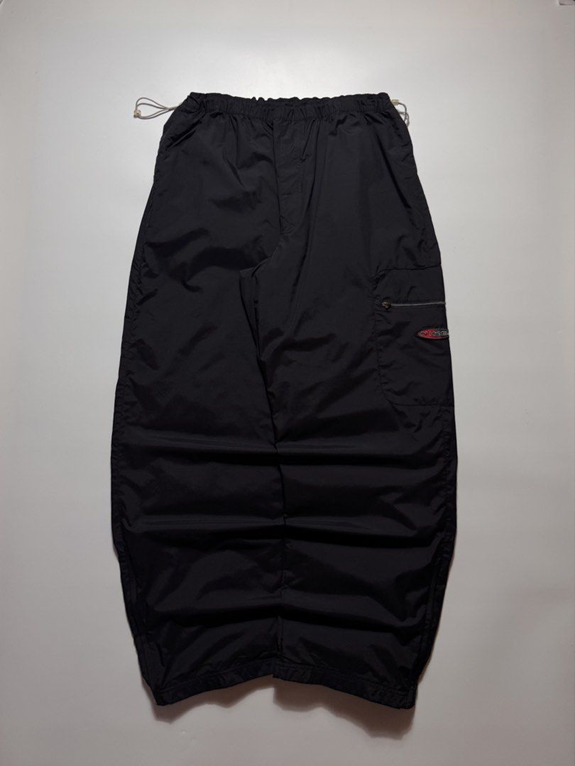 RARE 2000s NIKE BAGGY TRACK PANTS (Category: Joggers) located in Cebu City. Submitted by firenzegallery (Listing ID 1457944207, Image 1). Description: •Waist: 30-40 •Thigh: 17 •Length: 43 •Hem: 10 •Condition: 9.5 •Issue(s): none.