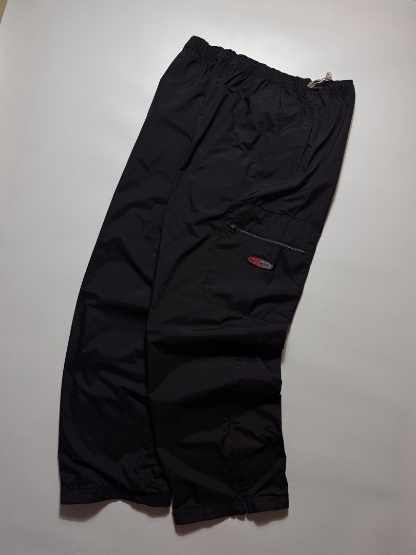 RARE 2000s NIKE BAGGY TRACK PANTS (Category: Joggers) located in Cebu City. Submitted by firenzegallery (Listing ID 1457944207, Image 2). Description: •Waist: 30-40 •Thigh: 17 •Length: 43 •Hem: 10 •Condition: 9.5 •Issue(s): none.