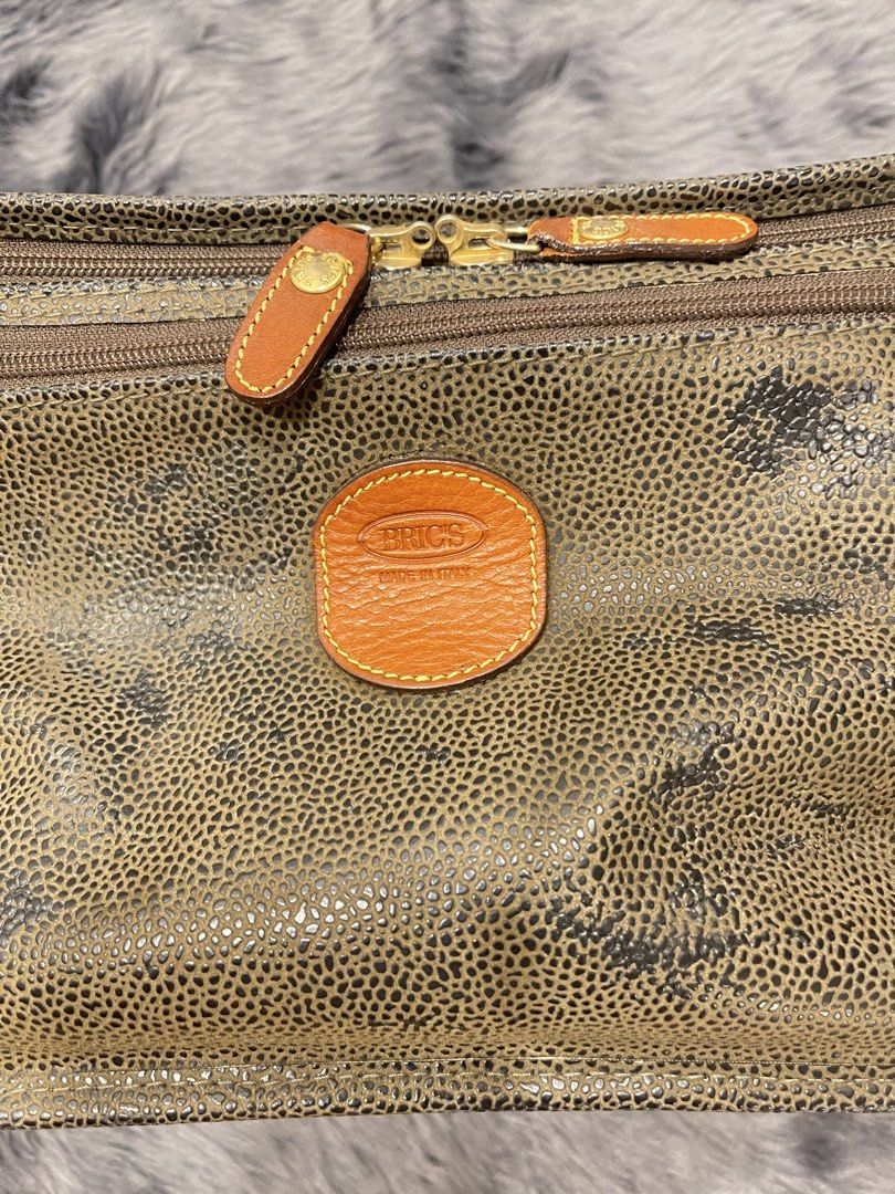 Rare Brics Vanity Travel Bag (Category: Purses & Pouches) located in Taguig. Submitted by thrifttreasures (Listing ID 1457945965, Image 2). Description: Condition 8/10 Clean interior With sling/long strap No dust bag Exterior has light scuffing on other parts due to use No other flaws to declare Rare find All leather.
