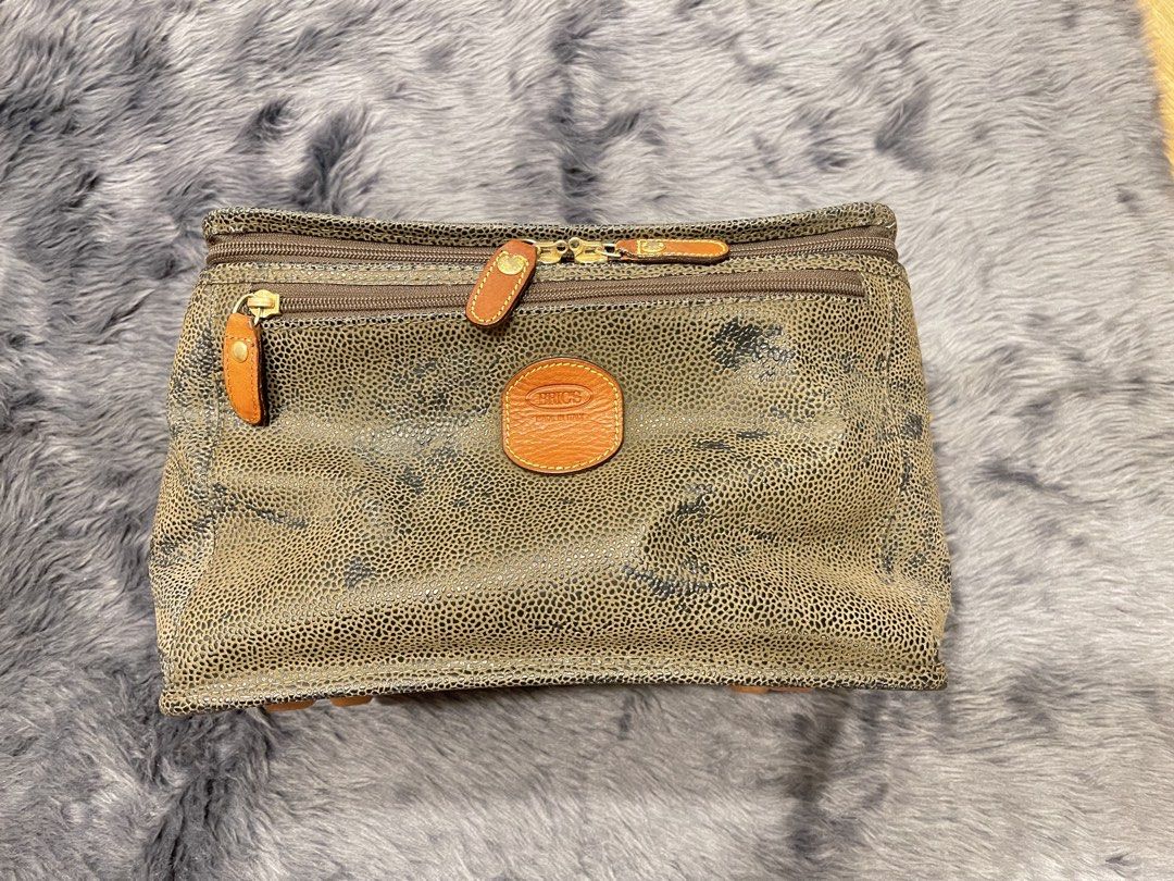 Rare Brics Vanity Travel Bag (Category: Purses & Pouches) located in Taguig. Submitted by thrifttreasures (Listing ID 1457945965, Image 1). Description: Condition 8/10 Clean interior With sling/long strap No dust bag Exterior has light scuffing on other parts due to use No other flaws to declare Rare find All leather.