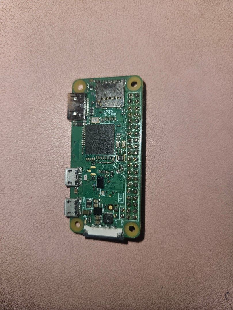 RASPBERRY PI ZERO W (Category: Computer Parts) located in Quezon City. Submitted by kondethzoe55343 (Listing ID 1458017715, Image 3). Description: Key Specs & Features Processor: 1GHz Single-Core CPU RAM: 512MB Connectivity: Built-in 802.11 b/g/n Wi-Fi & Bluetooth 4.1 (BLE) Ports: Mini HDMI, Micro-USB OTG port, and Micro-USB power port Includes: 1x Raspberry Pi Zero W board, 1x SanDisk 64GB MicroSD card (formatted/cleared) Condition: 9/10 — Mint 