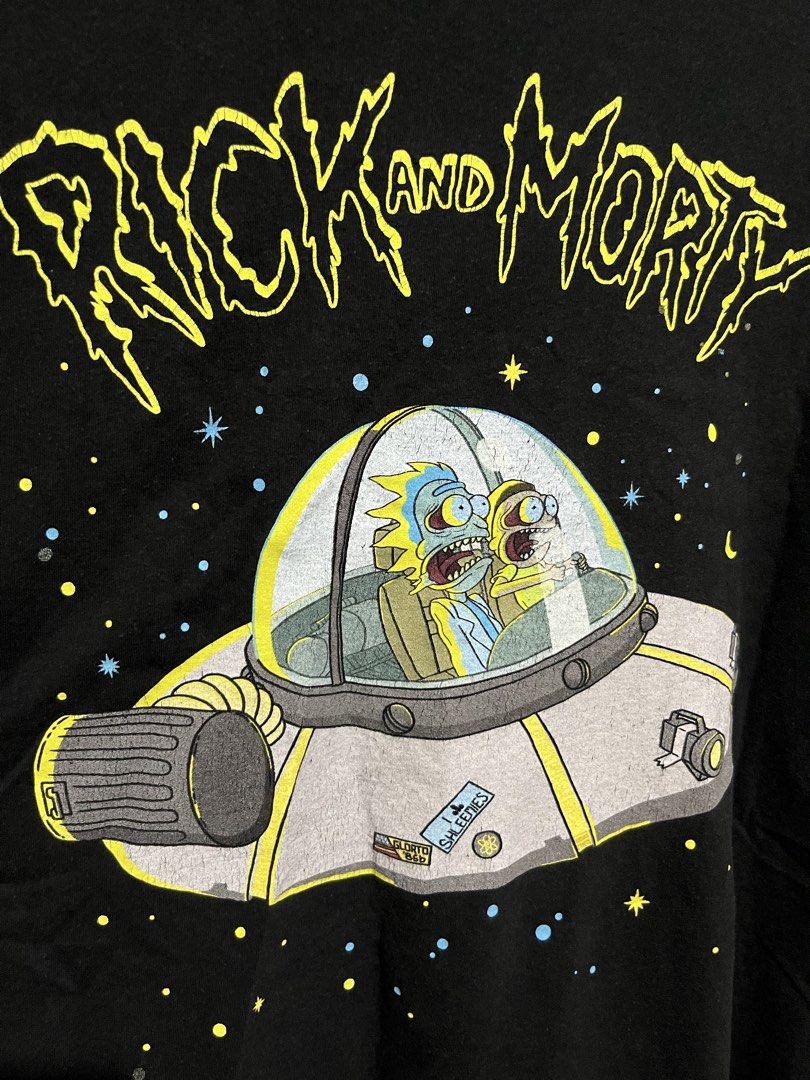 Rick and Morty Merch Tee (Category: Tshirts & Polo Shirts ) located in Santa Cruz. Submitted by wecareaboutthingswedonothave (Listing ID 1458059219, Image 3). Description: Width - 21 Length - 30 Large on tag Issue: Cracked prints. See picture .