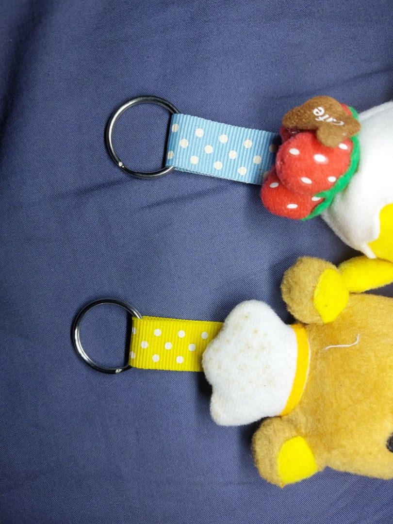Rilakkuma Cafe Bear & Kiiroitori Chick Plush Keychains Bundle (Category: Plushies & Soft Toys) located in Mandaluyong City. Submitted by 13thsilverrabbit (Listing ID 1457904225, Image 3). Description: - Adorable Rilakkuma cafe bear plush keychain with coffee cup. - Cute Kiiroitori chick plush keychain dressed as a chef, with strawberries. - Both feature attached keyrings. - Officially from San-X. - Ideal for decorating bags, backpacks, and more..