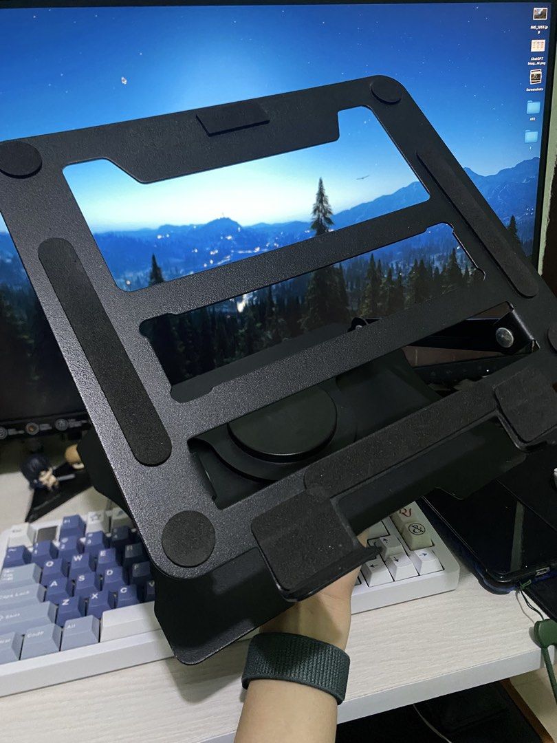 Rotating 360° Laptop Stand (Category: Laptop Bags & Sleeves) located in Imus. Submitted by jichupol (Listing ID 1458001738, Image 3). Description: - Sturdy aluminum construction - Adjustable and foldable design - Promotes laptop cooling with good airflow - Non-slip pads for device stability - Enhances ergonomics for comfortable work or gaming Selling as is, manage your expectations rfs: di na nagagamit.