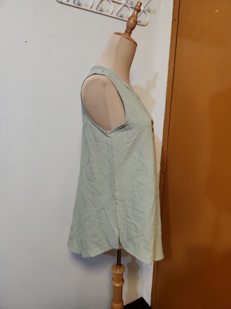 Sage green sleeveless Small to med (Category: Blouses) located in Marikina City. Submitted by KanamiFinds (Listing ID 1458062716, Image 2). Description: bust: 36 inches length:26 inches from the shoulders.