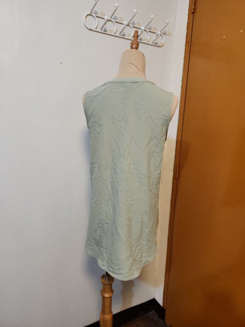 Sage green sleeveless Small to med (Category: Blouses) located in Marikina City. Submitted by KanamiFinds (Listing ID 1458062716, Image 3). Description: bust: 36 inches length:26 inches from the shoulders.