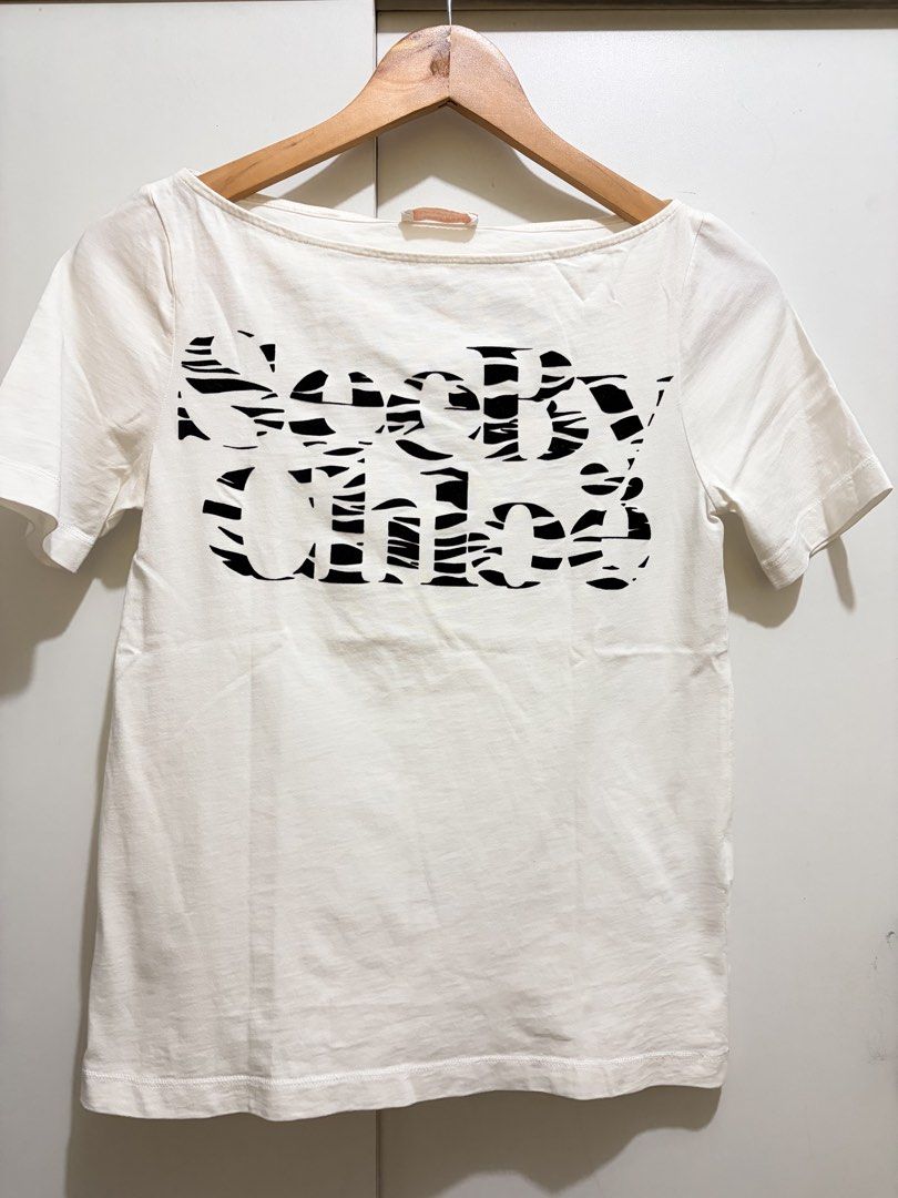 See by Chloe White Tee (Category: Shirts) located in Pasig City. Submitted by shopsmart.mnl (Listing ID 1457920231, Image 2). Description: In very good condition S in tag.