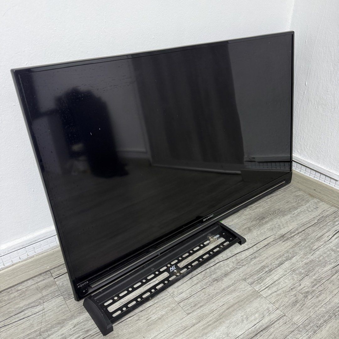 Sharp 42” Tv (Category: TV) located in Singapore. Submitted by own.buy.sell (Listing ID 1458047433, Image 1). Description: Comes with bracket.