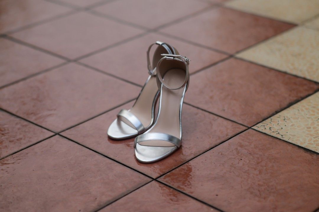 Silver Ankle Strap Stiletto Heels (Category: Heels) located in Tabaco. Submitted by d.allyza (Listing ID 1458001025, Image 3). Description: Silver Strappy Stiletto Heels • Elegant silver strappy heels with a sleek, minimalist design • Thin ankle strap with adjustable buckle • Open-toe style with a classic stiletto heel • Size: EU 41 • Used only once for a debut • Excellent condition — no damage or visible defects • Carefully kept and still in gre
