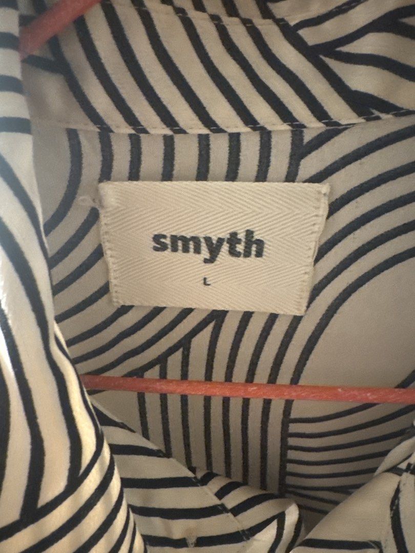 Smyth Short Sleeve Button Up Shirt Size L (Category: Tshirts & Polo Shirts ) located in Bacoor. Submitted by cosmic_keonho (Listing ID 1458052076, Image 2). Description: - Smyth short sleeve shirt - Length 28 inches / Width 24 inches - Unique abstract line pattern all over - Button up front - 1 chest pocket - Size L - Great for casual wear or a statement piece.