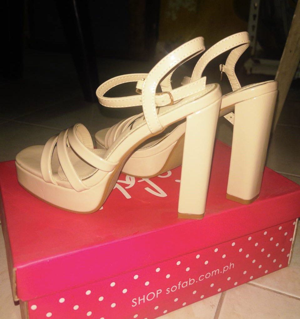 Sofab Beige Platform Heels (Category: Heels) located in Manila. Submitted by cleopatra.13 (Listing ID 1458072726, Image 2). Description: - Beige platform heels - Chunky block heel - Ankle strap - Strappy design across the front - Includes original box - Ideal for elevating any outfit.