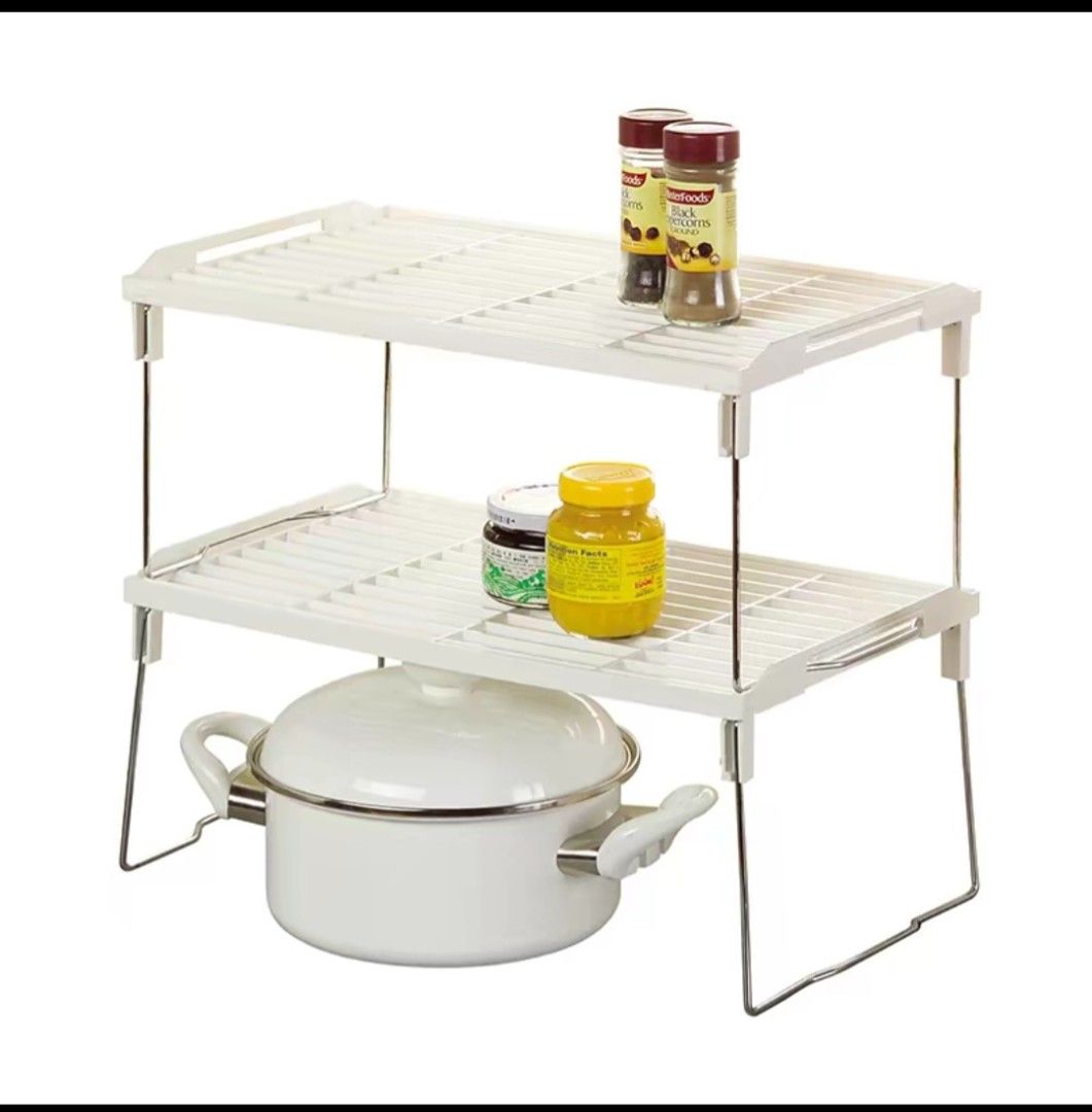 Stack storage X2 (Category: Storage & Organization) located in Singapore. Submitted by heytherehru (Listing ID 1458022599, Image 1). Description: - Stackable storage shelves, set of 2 Prices are for two. - White color, clean and modern design - Ideal for organizing kitchen items like spices, jars, pots, and dishes Or face products and toilet stuff - Creates vertical storage space - Maximizes kitchen organization and efficiency.