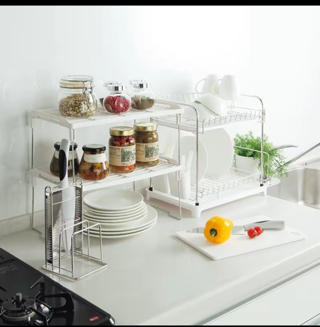 Stack storage X2 (Category: Storage & Organization) located in Singapore. Submitted by heytherehru (Listing ID 1458022599, Image 3). Description: - Stackable storage shelves, set of 2 Prices are for two. - White color, clean and modern design - Ideal for organizing kitchen items like spices, jars, pots, and dishes Or face products and toilet stuff - Creates vertical storage space - Maximizes kitchen organization and efficiency.