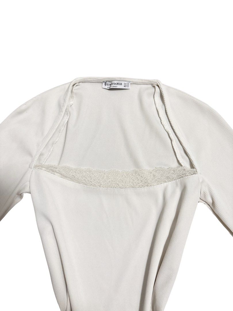 Stradivarius White Lace Long Sleeve Top (Category: Longsleeves) located in Manila. Submitted by j_decluttering (Listing ID 1458011321, Image 2). Description: - cute unique neckline with lace - nice fit.