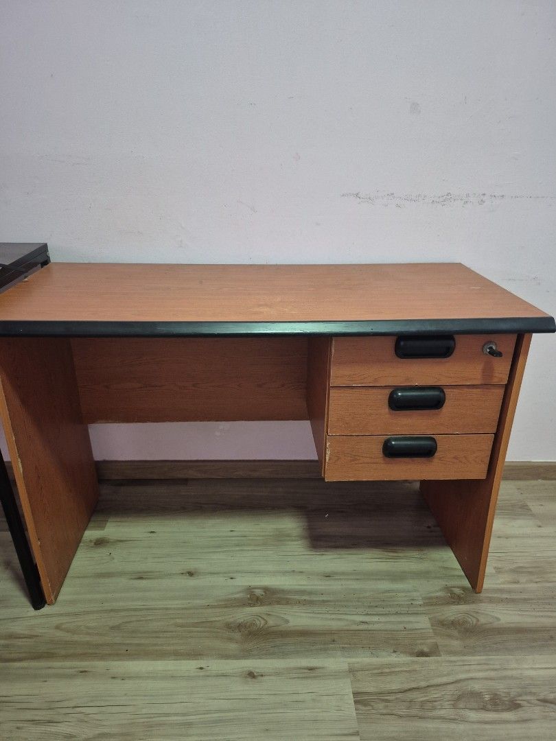 Study table (Category: Shelves, Cabinets & Racks) located in Singapore. Submitted by leatherbaybeh (Listing ID 1457982032, Image 1). Description: - Wooden wall shelf with integrated cabinet - Cabinet features 3 black oval handles on doors - Open shelf space below the cabinet - Black trim along the front edge of the shelf - Compact design, perfect for organizing small items 105 (L) x 48 (D) x 68 (H) cm .