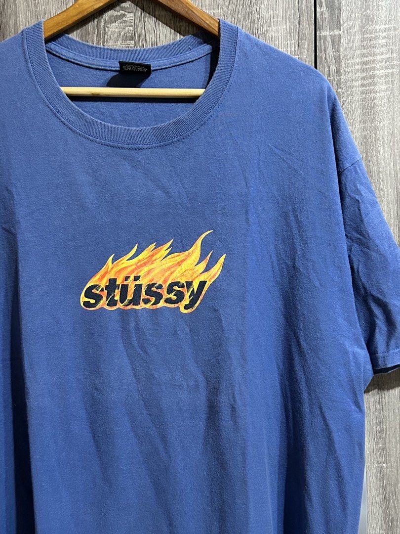 STUSSY BLUE FLAMES TEE (Category: Tshirts & Polo Shirts ) located in Cotabato. Submitted by rcycle.bn (Listing ID 1458002520, Image 2). Description: 23-24x30 Authentic Excellent 9/10 Cracks print + sf.