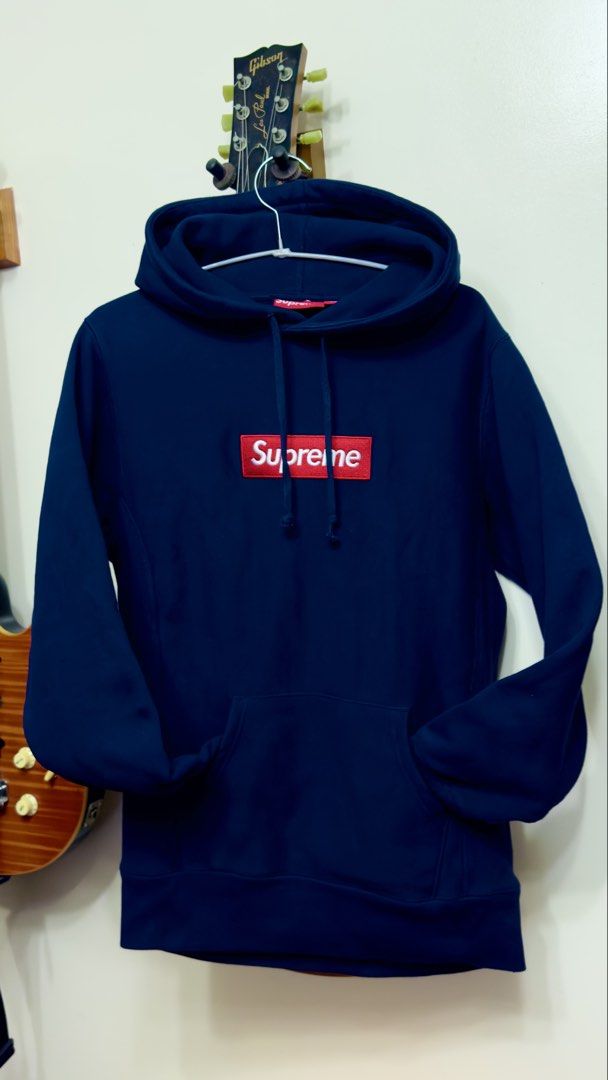 Supreme Box Logo Hoodie Navy Blue (Category: Hoodies) located in Balanga. Submitted by bluesero (Listing ID 1458087642, Image 1). Description: - Classic Supreme Box Logo Hoodie - Color: Navy Blue - Material: 100% Cotton - Features iconic red box logo on front - Ribbed cuffs and hem in very good condition - Made in Canada - size Small on tag (W20in X L27in).