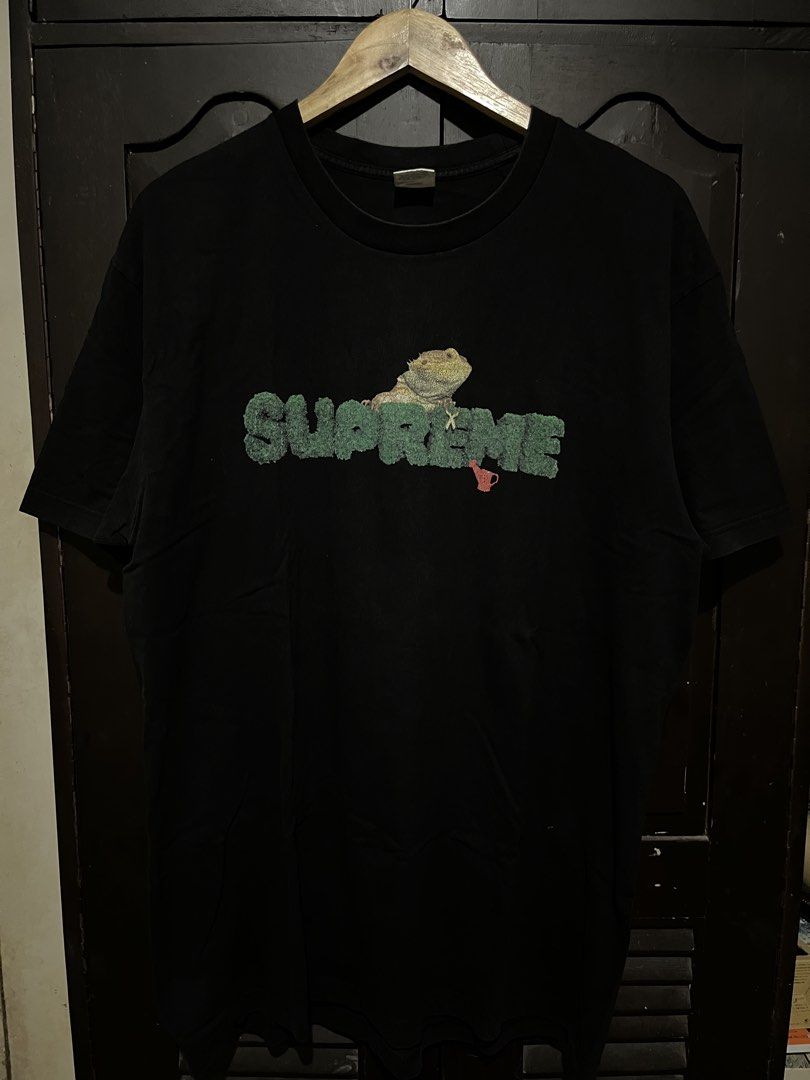 Supreme Lizard Tee (Category: Tshirts & Polo Shirts ) located in Santa Cruz. Submitted by wecareaboutthingswedonothave (Listing ID 1458058642, Image 1). Description: Width - 24 Length - 31 XL on tag Issue: Cracked prints Note: Authenticy is not guranteed. .