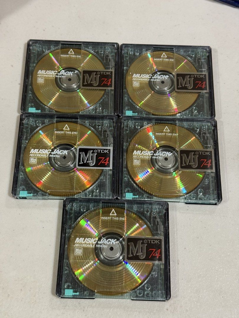 TDK MiniDiscs 5-pack (Category: Portable Music Players) located in Makati City. Submitted by see5o5 (Listing ID 1457921328, Image 2). Description: TDK Minidisc 74 5 pcs with cases for 800 Chose which series you prefer. Music Jack gold or Fine color series available. These are in used condition with light scratches and wear typical for minidiscs. But they all work well and are read quickly. All have been blanked and are ready for recording. Makati