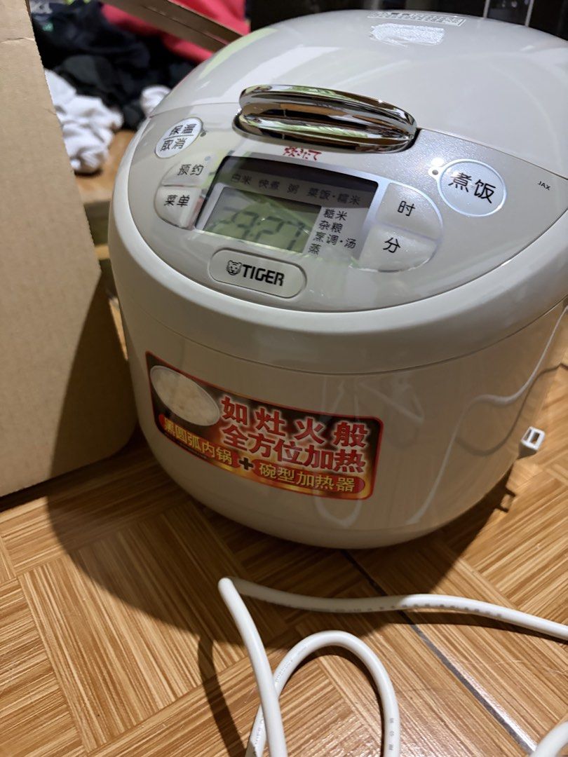 Tiger Jax microcomputer controlled rice cooker (Category: BBQ, Grills & Hotpots) located in Baguio. Submitted by suffering (Listing ID 1458041458, Image 2). Description: Brandnew never used yet Baguio City location .