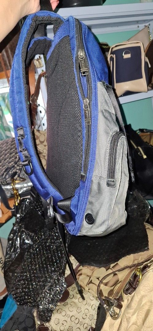 Tumi Backpack Blue Grey Nylon (Category: Backpacks) located in Tagum. Submitted by annukay (Listing ID 1457909469, Image 3). Description: - Brand: Tumi - Color: Blue and Grey - Material: Durable Nylon - Features: Multiple zippered compartments for organization - Comfort: Padded straps - Ideal for: Travel or daily use - Condition: Please check photos for details.
