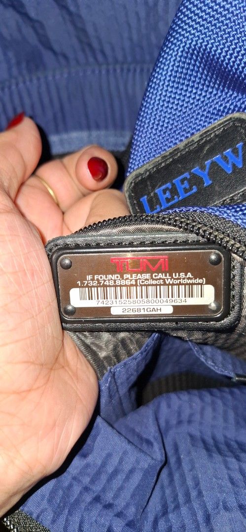Tumi Backpack Blue Grey Nylon (Category: Backpacks) located in Tagum. Submitted by annukay (Listing ID 1457909469, Image 2). Description: - Brand: Tumi - Color: Blue and Grey - Material: Durable Nylon - Features: Multiple zippered compartments for organization - Comfort: Padded straps - Ideal for: Travel or daily use - Condition: Please check photos for details.