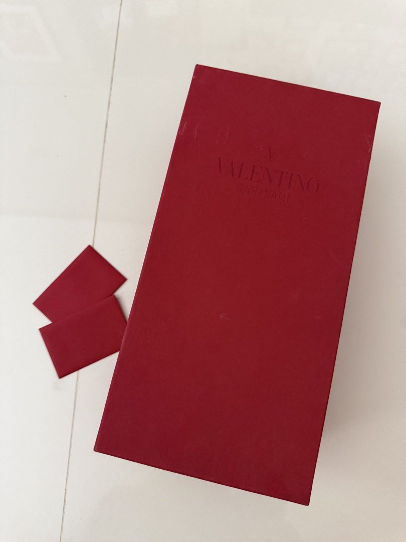 Valentino Garavani Red Box with Small Envelopes (Category: Luxury Bags & Wallets) located in Manila. Submitted by hotdealsph (Listing ID 1457970716, Image 1). Description: - Authentic Red Valentino Garavani box - Comes with two small red envelopes - Ideal for organizing small treasures or as a charming gift box.