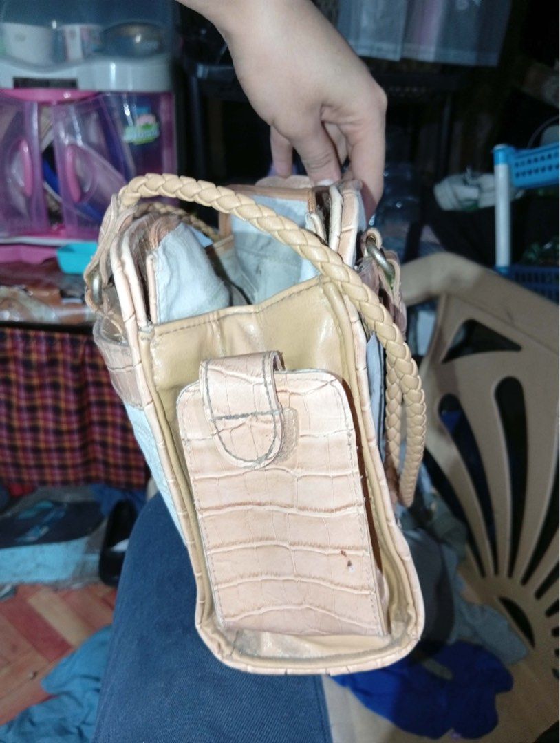 Vintage casual shoulder bag (Category: Luxury Bags & Wallets) located in Abucay. Submitted by thriftshop__by__liezel (Listing ID 1458011941, Image 3). Description: shoulder tote bag / casual everyday bag with a vintage-inspired design 😊 Bag Details from the photo: - Style: Medium shoulder tote / handbag - Material: Jacquard/embossed fabric body + faux leather/PU trim in nude/tan - Details: - Braided rope handles - Metal logo plaque in the center